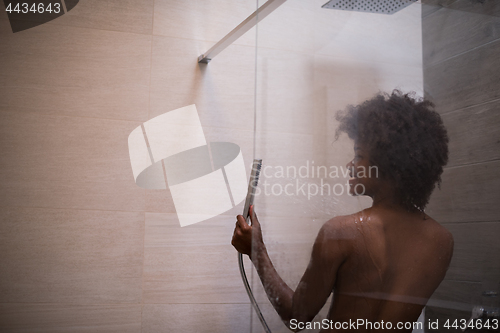 Image of African American woman in the shower