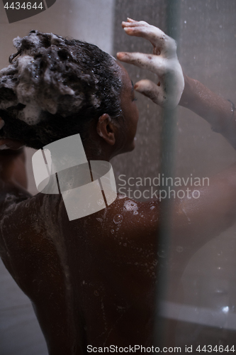 Image of African American woman in the shower