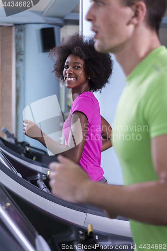 Image of people exercisinng a cardio on treadmill in gym