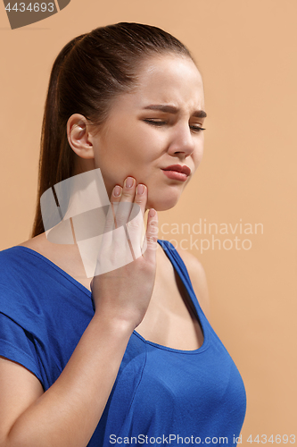 Image of Young woman is having toothache.