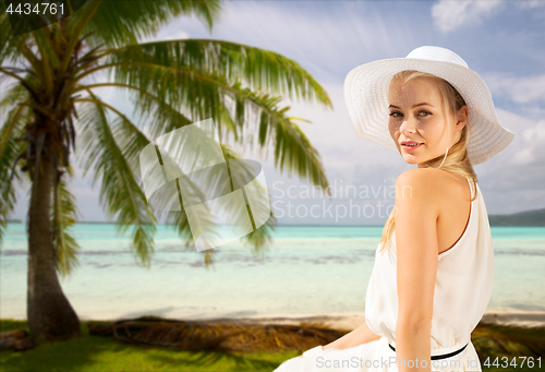 Image of beautiful woman enjoying summer over beach