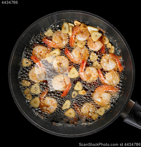 Image of frying garlic prawns