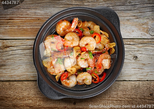 Image of bowl of garlic prawns