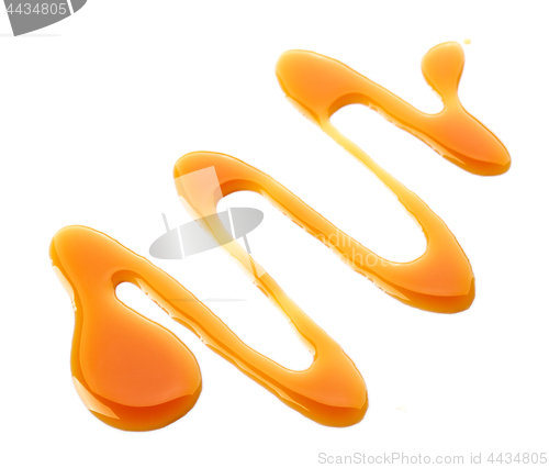 Image of caramel sauce on white background