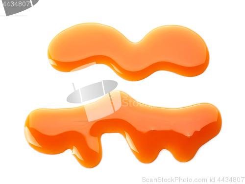 Image of caramel sauce on white background