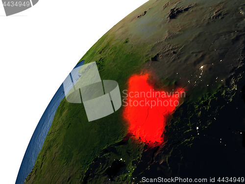 Image of South Sudan in red on Earth at night