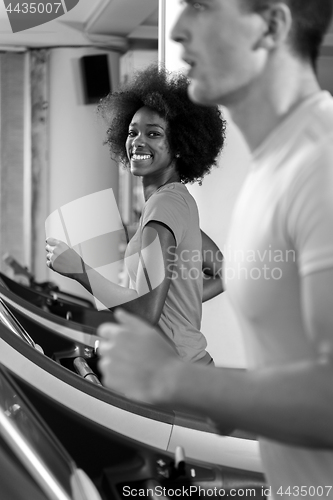 Image of people exercisinng a cardio on treadmill in gym