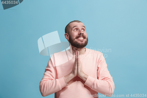 Image of Winning success man happy ecstatic celebrating being a winner. Dynamic energetic image of male model