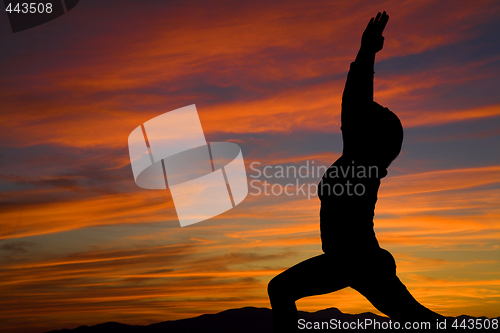 Image of yoga over sunset