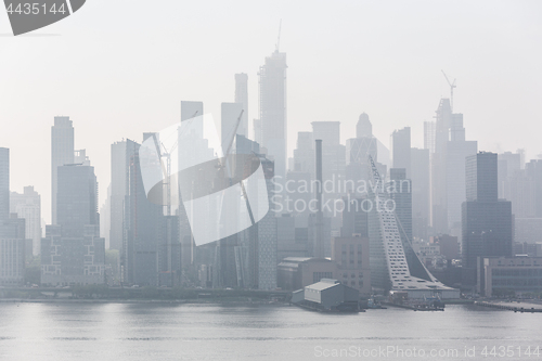 Image of New York City midtown Manhattan skyline panorama view from Boulevard East Old Glory Park over Hudson River.