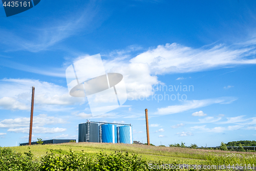Image of Industrial factory with large silos in blue colors