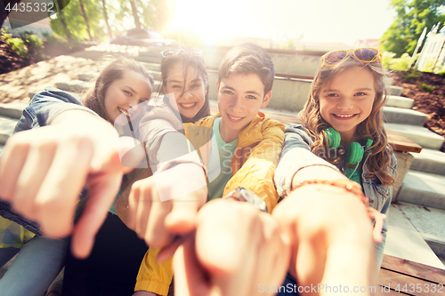 Image of teenage friends or students pointing finger at you