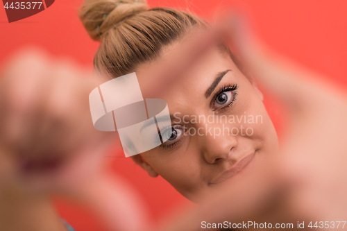 Image of young woman over color background