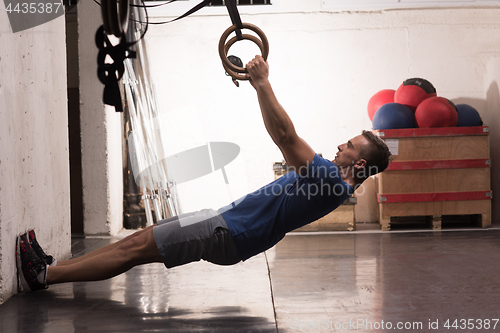 Image of man doing dipping exercise