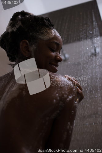 Image of African American woman in the shower