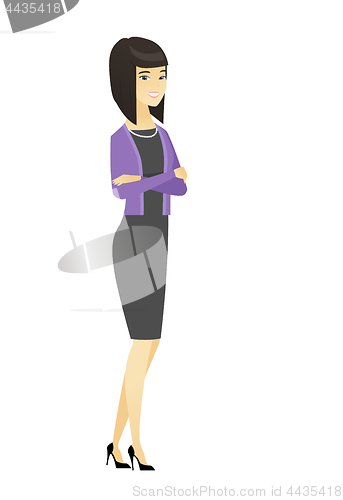Image of Asian business woman standing with folded arms.