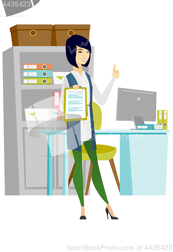 Image of Business woman with clipboard giving thumb up.