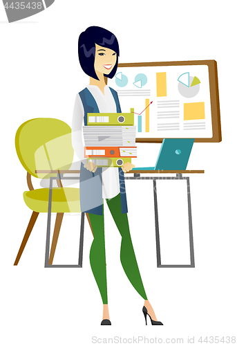 Image of Business woman holding pile of folders.