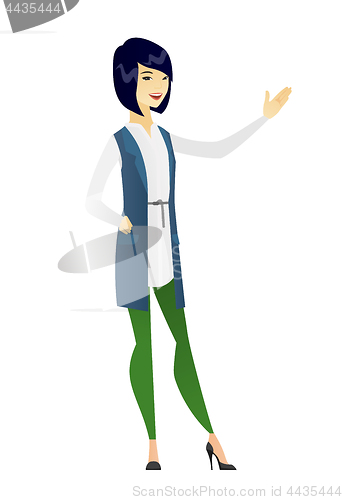 Image of Asian business woman showing a direction.
