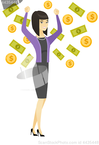 Image of Happy busiess woman under money rain.