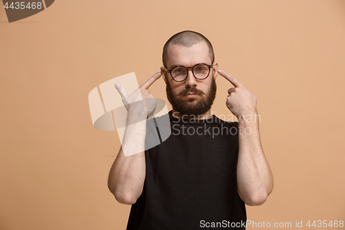 Image of Handsome man in stress isolated on pastel