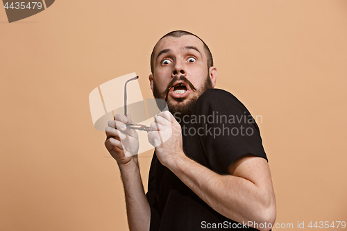 Image of Portrait of the scared man on pastel