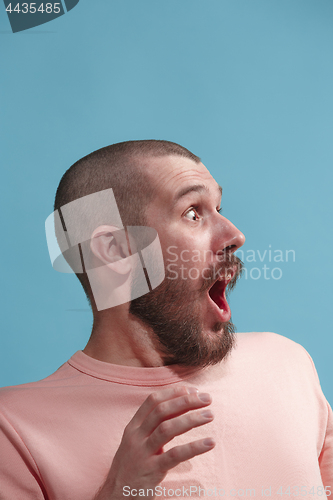 Image of Isolated on pastel young casual man is afraid at studio