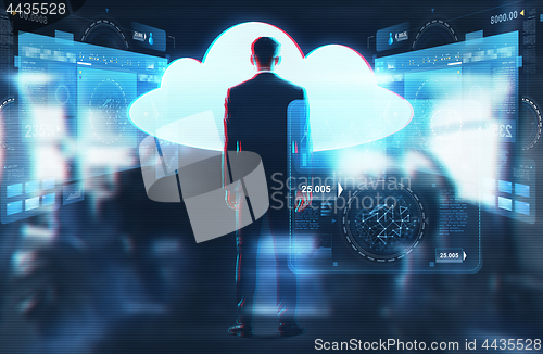 Image of businessman looking at virtual cloud hologram