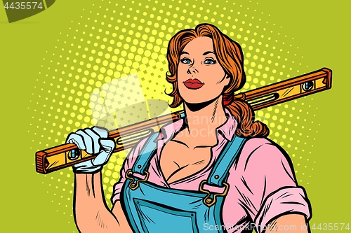 Image of female construction worker with level