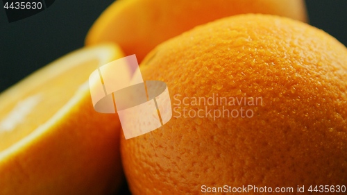 Image of Closeup whole and cut orange 