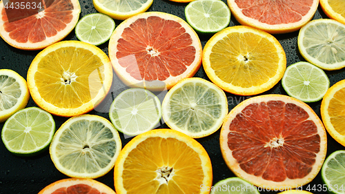 Image of Assortment of sliced citruses 