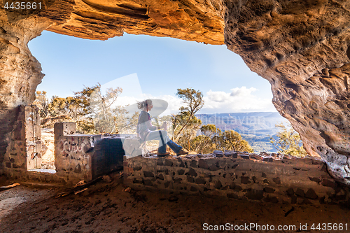 Image of Cave chilling cliff side views for miles, travel tourism