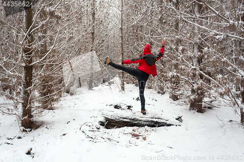 Image of Stretching outdoors in the snow