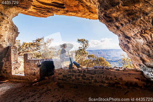 Image of Cave chilling cliff side views for miles, travel tourism