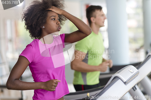 Image of people exercisinng a cardio on treadmill