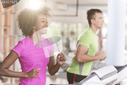 Image of people exercisinng a cardio on treadmill