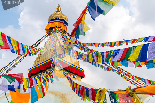 Image of Boudhanath Stupa and prayer flags in Kathmandu