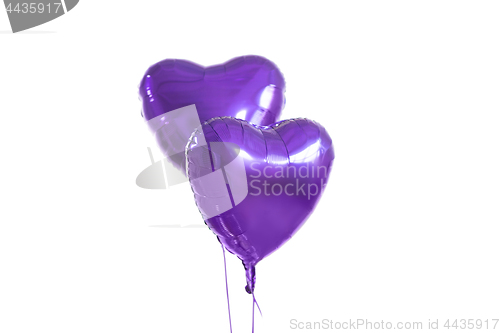 Image of close up of helium balloons over white background