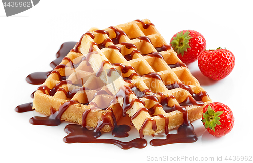 Image of waffles with strawberries and chocolate sauce