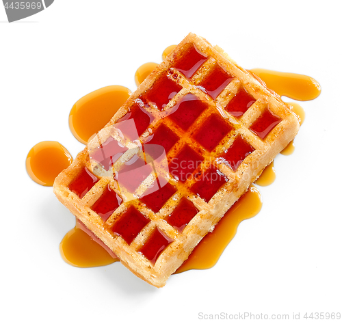 Image of waffle with honey syrup