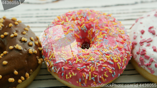 Image of Glazed sweet doughnuts in closeup