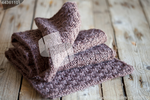 Image of Brown knitted wooden scarf