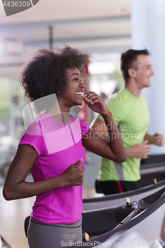 Image of people exercisinng a cardio on treadmill