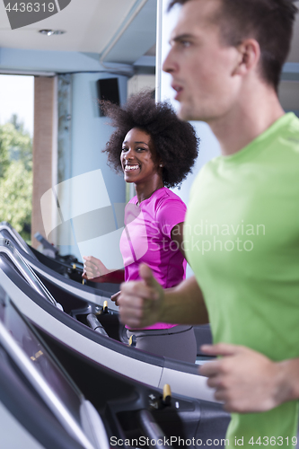 Image of people exercisinng a cardio on treadmill in gym