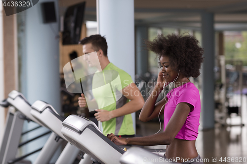 Image of people exercisinng a cardio on treadmill