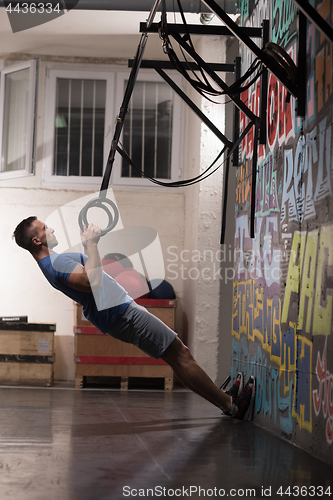 Image of man doing dipping exercise