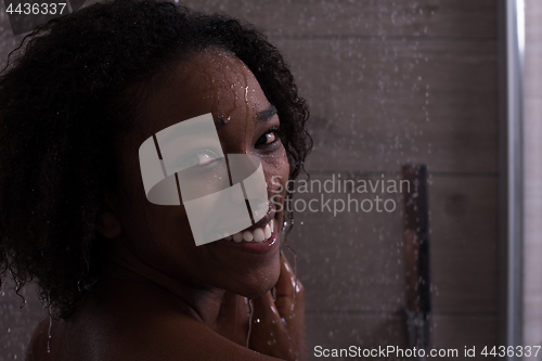 Image of African American woman in the shower