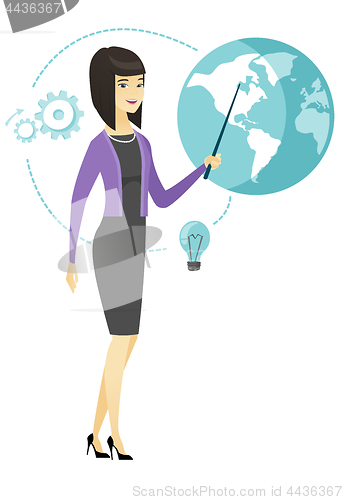 Image of Asian business woman pointing at a globe.