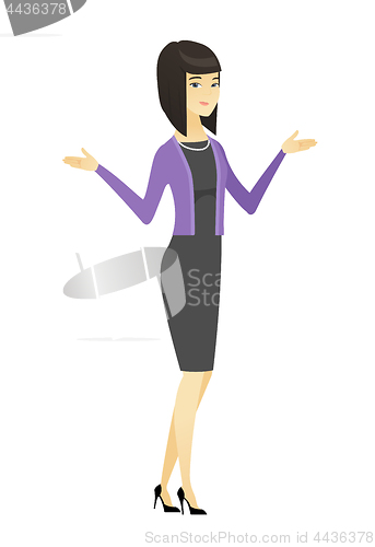 Image of Asian confused business woman with spread arms