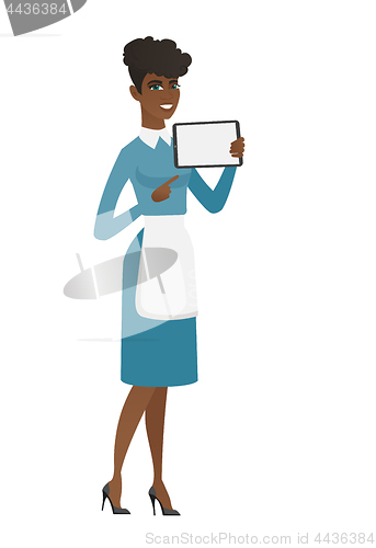 Image of Smiling cleaner holding tablet computer.